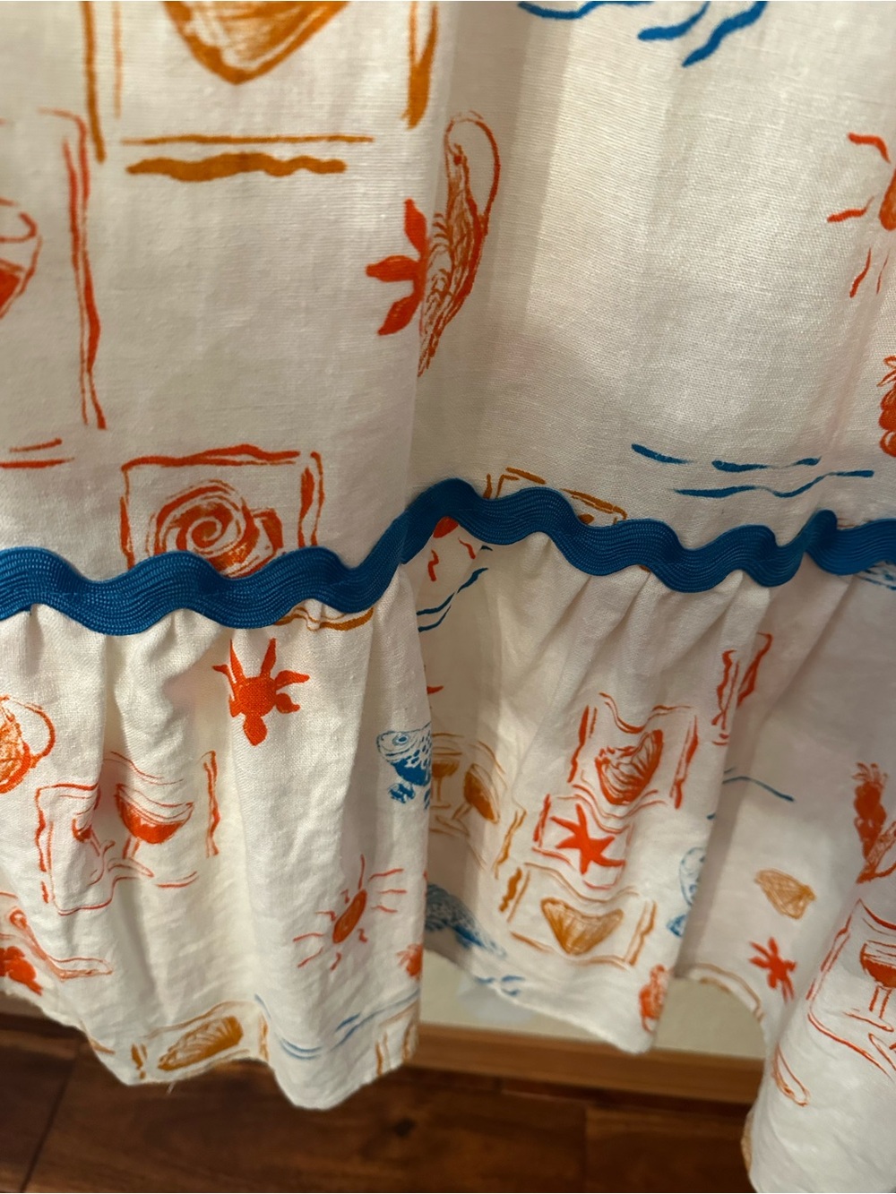 CeCe Cream Maxi Dress with Blue Trim and Orange Print Detail - Picture 7 of 10